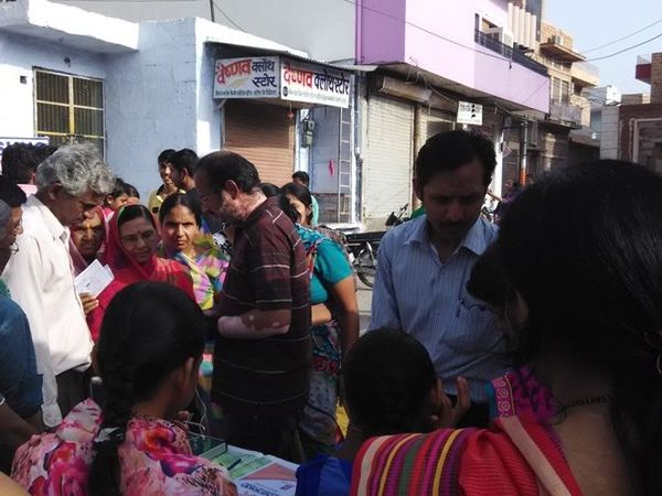 Visitors gathering at a camp in a Jodhpur neighbourhood